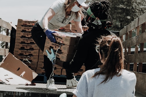 food pantry volunteers helping clients